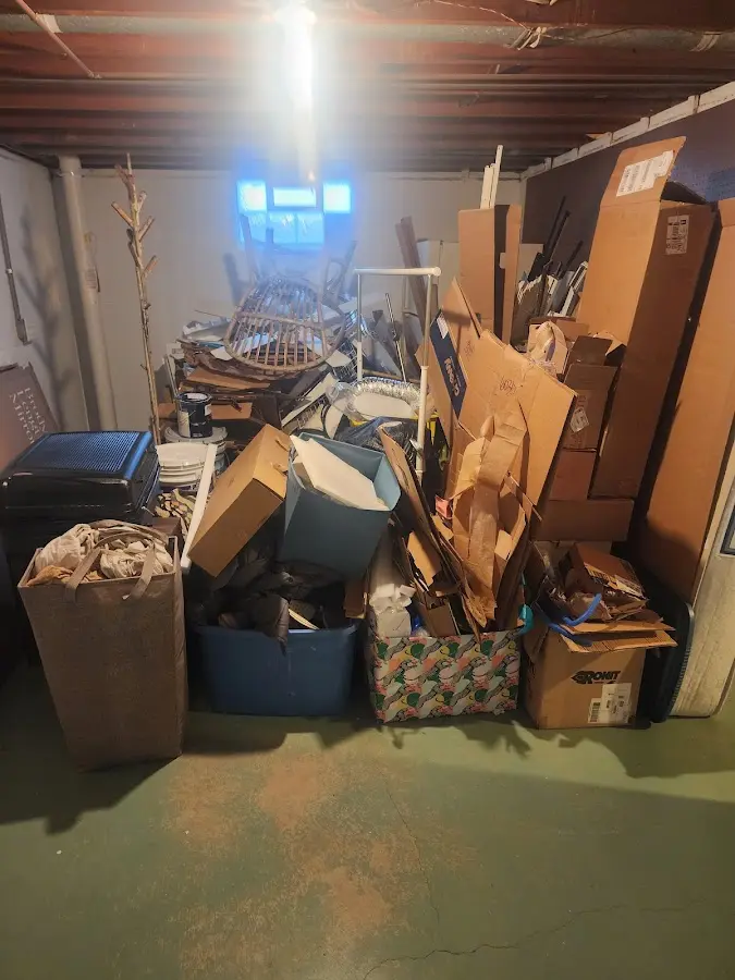 Roll-off dumpster container at job site for 20 Yard Dumpster Rental in Fairfield Glade